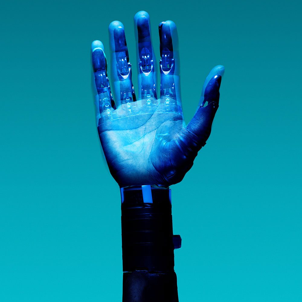 Human hand blended with mechanical arm